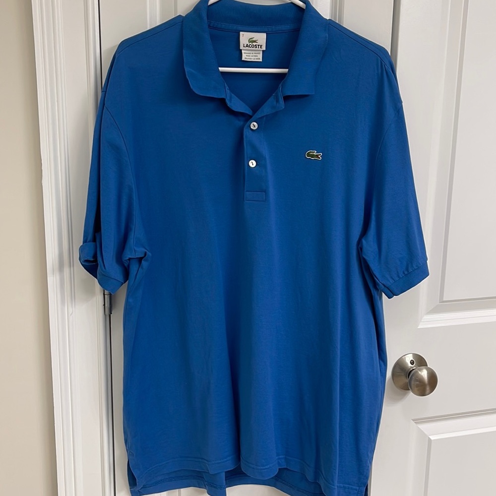 Lacoste blue polo shirt size 7/XXL. Very good gently used condition.